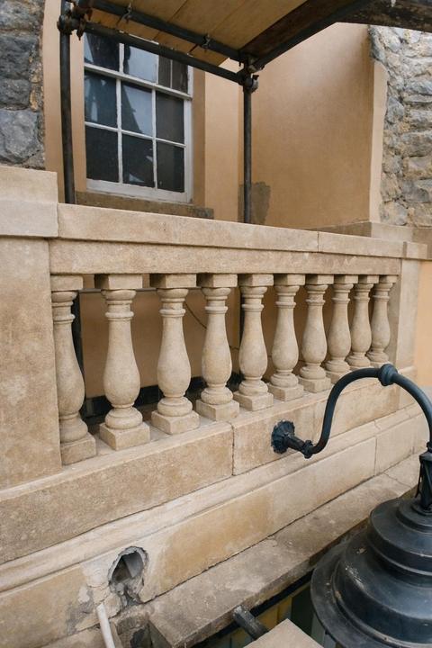 Stone balustrade and plinth wall