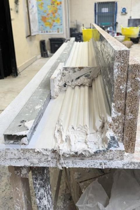 Long cornice lengths being cast in the workshop