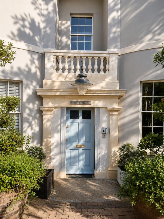 Georgian doorway with balustraded balcony above