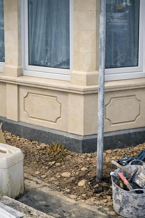 Stone bay with raised panels