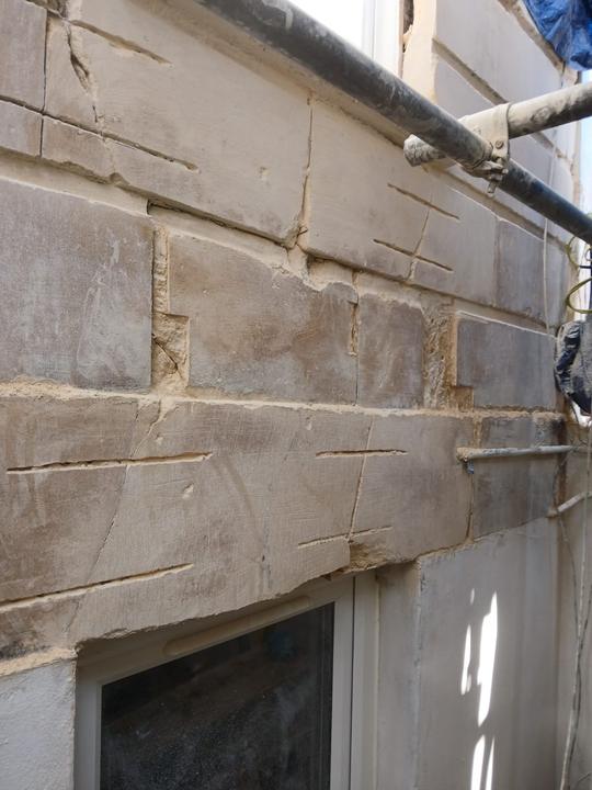 Weathered stone blocks before restoration